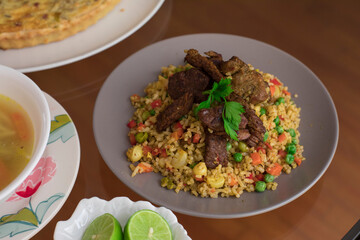 Green rice with meat Buffet table peruvian food gourmet restaurant