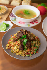 Green rice with meat Buffet table peruvian food gourmet restaurant