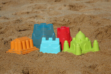 beach toys in the shape of a colorful city