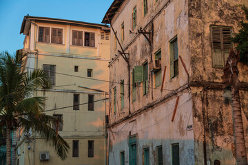 ZANZIBAR, TANZANIA - September 2019: Exterior if old colonial buildings in Stone Town in the light of sunset