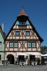 Rothenburg ob der Tauber, Ansbach district, Germany . Small restaurant in the center of an old town district of Rothenburg ob der Tauber.