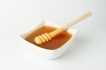 high quality honey with wood stick