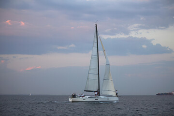 Obraz premium Sailing yacht regatta. Sailboats under sail in the race. Yachting. Luxury yachts.