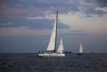 Fototapeta premium Sailing yacht regatta. Sailboats under sail in the race. Yachting. Luxury yachts.