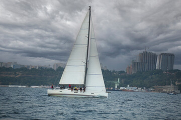 Sailing yacht regatta. Sailboats under sail in the race. Yachting. Luxury yachts.