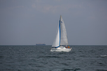 Fototapeta premium Sailing yacht regatta. Sailboats under sail in the race. Yachting. Luxury yachts.