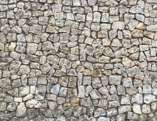Texture of a stone wall. Old stone wall texture background