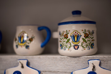 Clay pots in kashubian composition, a souvenir from the Kashubian region in Poland.