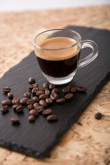 Small cup of coffee machine beans grains gourmet beverage waking up breakfast