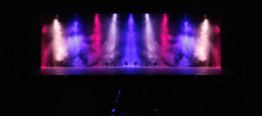 scene, stage light with colored spotlights and smoke
