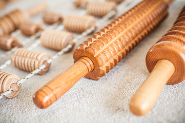 Wood massage, maderotherapy, wooden rolling pin or battledore tools for anti cellulite treatment to...