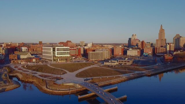 2021 - Excellent aerial shot of of architecture, a park, and a bridge spanning a river in Pawtucket, Rhode Island.