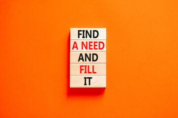 Find a need and fill it symbol. Concept words Find a need and fill it on wooden blocks on a beautiful orange table orange background. Business and find a need and fill it concept. Copy space.