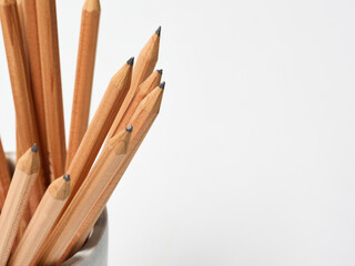Natural cedar wood pencils stored in marble cup