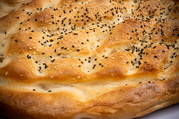 Ramadan bread. Pita bread with sesame 