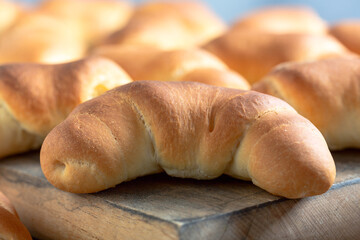 Homemade crescent buns close up.