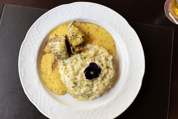 Filet mignon with mustard sauce served with a delicious Italian risotto.