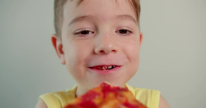 Close Up Portrait Child Happy Funny Little Boy Eagerly Eat Delicious Pizza,smiling Child Looking At Camera At Home Eating Italian Pizza,cute Kid Child With Pretty Face Eagerly. Concept Happy Childhood