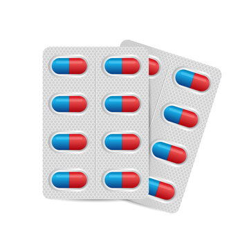 Red and blue pills in blister packaging isolated on white background