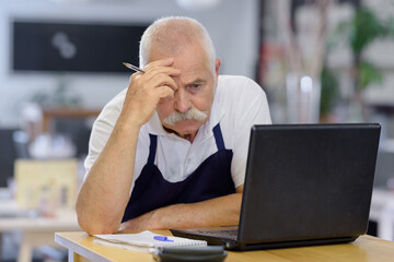 picture of problematic worker in his workshop