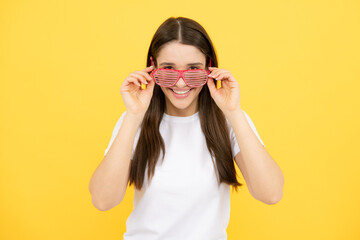 Portrait of beautiful woman with funny glasses. Celebration and party. Girl having fun, portrait on...