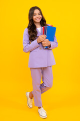 Fototapeta premium Teenager school girl study with books. Learning knowledge and kids education concept.