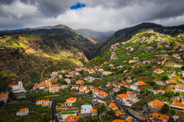Panoramic view from Ponta do Sol village on Madeira island, Madeira, Portugal. October 2021. Long exposure picture. - obrazy, fototapety, plakaty