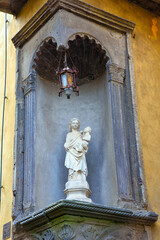 religious votive shrine by anonymous artist in Volterra tuscany Italy