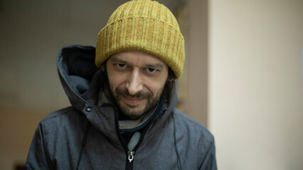 Portrait of guy in hat. Man in jacket. Middle-aged man.