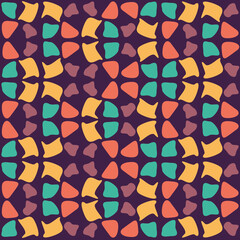 pattern of simple shapes in various colors