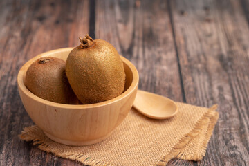Kiwi fruit in a wood bowl