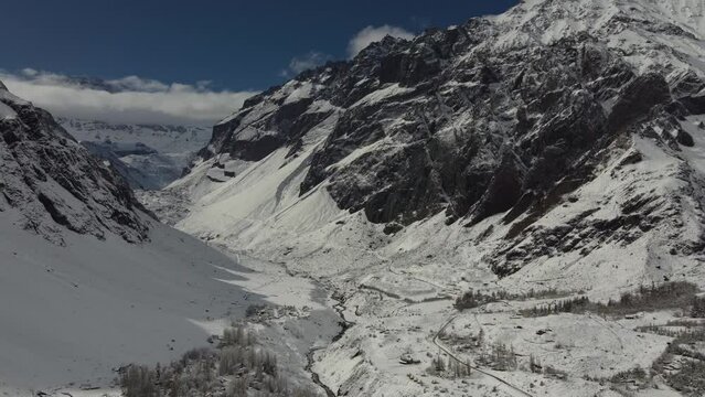 Trekking in winter season. Snowed mountains in La Egorda Valley, Caj n del Maipo, central Andes mountain range, Chile 