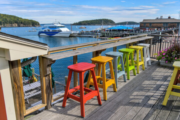 Seaside Resort - A sunny Autumn morning view of a quiet waterfront resting area at shore of Frenchman Bay. Bar Harbor, Mount Desert Island, Maine, USA.