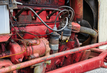 Antique four cylinder gasoline tractor engine.