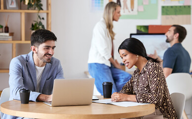 Collaboration, teamwork and strategy meeting for business colleagues sitting at a desk and working together. Happy coworkers writing a growth proposal or marketing plan together at the workplace