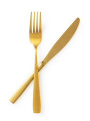 Golden knives and forks set against a white background. Gold cutlery. Beautiful gold cutlery.