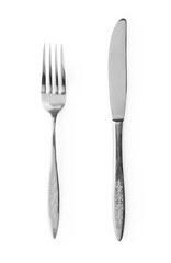Silver knives and forks placed on a white background. Retro cutlery.