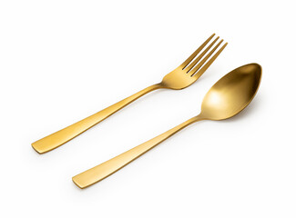 Gold spoons and forks placed on a white background.