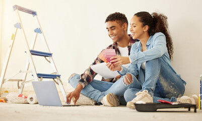 Interior design planning home renovation with laptop, paint colour choices and happy couple time...