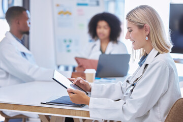 Teamwork, innovation and doctors working on digital tablet in a meeting or conference, reading and...