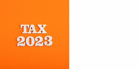 Payment of taxes for the year 2023 - White numbers on orange background