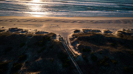 Aerial view of coastline and sand dunes of Ocracoke Island at sunrise, North Carolina, USA. 