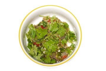 Young chili paste in a white casserole garnished with coriander leaves