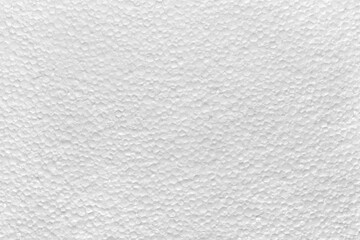 Background, photo texture from porous material, white polystyrene close-up.