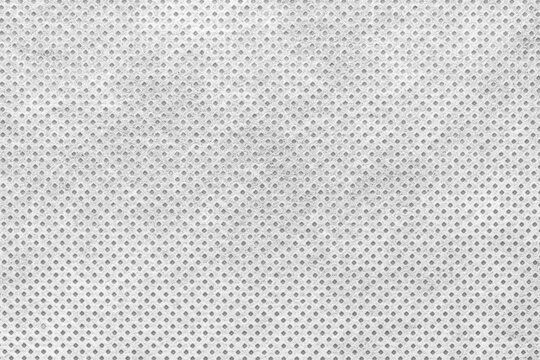 Interlining, synthetic fiber in pastel colors, as a background and texture.