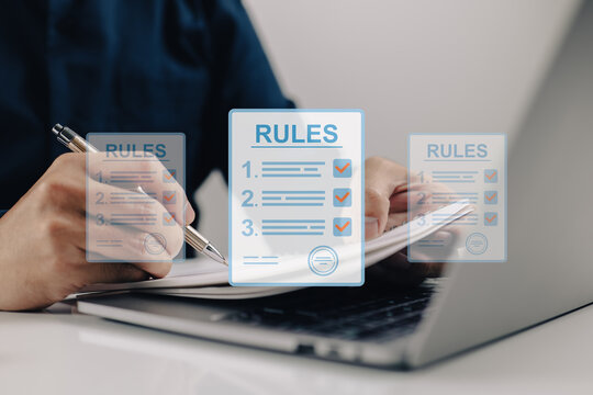 Businesspeople read and study guidelines, make checklists, and study rule lists. Concept of corporate rules, limitations, and laws.
