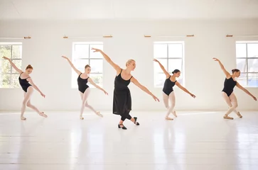 Wall murals Dance School Ballet, dance students and teacher in class for practice, training and performance in studio. Classic art dancers moving with balance, grace and passion during a lesson at a ballerina dancing school