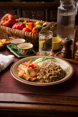 Escabeche fried fish with onions and lentils stew white rice Buffet table Peruvian comfort restaurant gourmet food