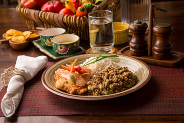 Escabeche fried fish with onions and lentils stew white rice Buffet table Peruvian comfort restaurant gourmet food