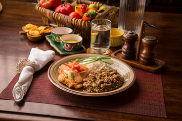 Escabeche fried fish with onions and lentils stew white rice Buffet table Peruvian comfort restaurant gourmet food